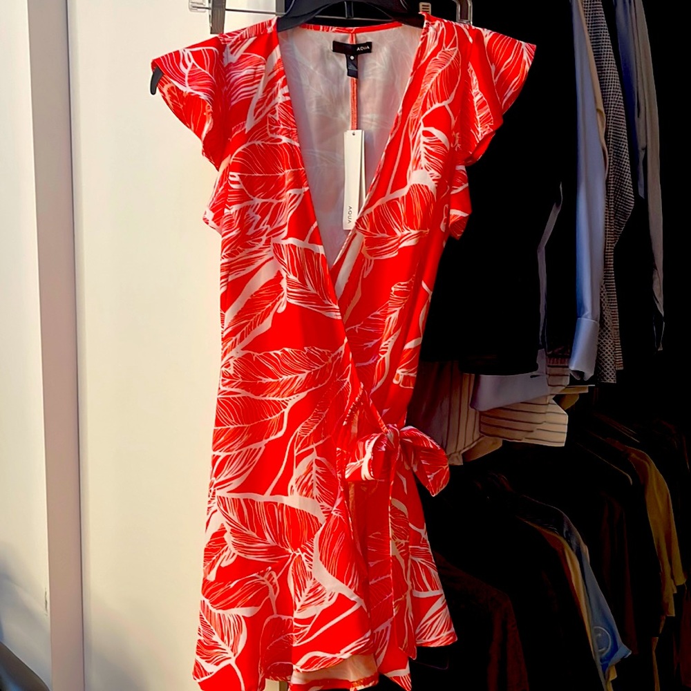 Aqua mini wrap dress. Large size but fits smaller. New with tags